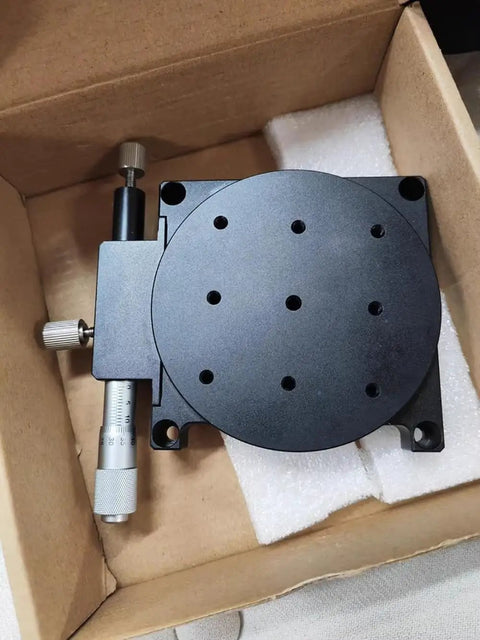 Top view of R Axis Rotary Stage Pro Grade With 360 Degree Rotation And Micrometer Micro Adjustment on aluminum alloy, RS90 L in box.