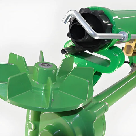 Close-up of heavy duty irrigation spray gun with adjustable angle turbine sprinkler, ergonomic handle, and replaceable nozzles.
