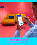 Person using smartphone to set up 48Ft Color Changing Outdoor String Lights With Weatherproof Design No Fuss Adapter Included Control Via Connected App And Voice Control Easy WiFi Setup For Smart Home Ambience