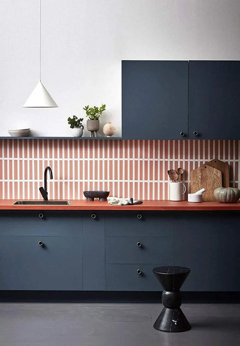 Modern kitchen with blue cabinets, featuring 10 Pack Brass Round Cabinet Knobs One And One Quarter Inch Diameter Gold Drawer Pulls.