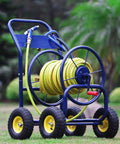 Built Like A Tank Heavy Duty Garden Hose Cart With Spray Gun, yellow hose on blue steel cart, rolls easily on wheels.