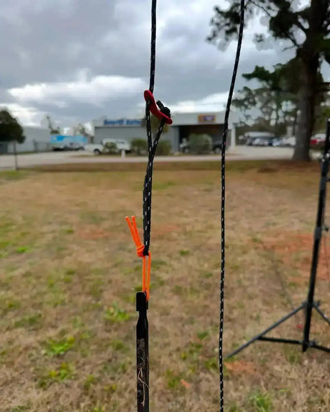 Tall Tripod Stabilization Kit for TST 20 with nylon ropes and cinches secured in an outdoor setting.