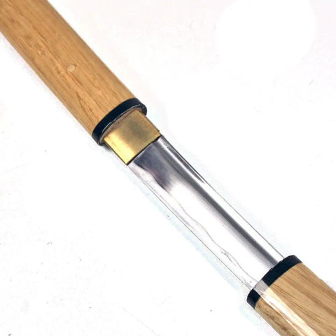 Close-up of Handmade Japanese Shirasaya Samurai Katana With 26.5 Inch Carbon Steel Blade and natural wood handle.