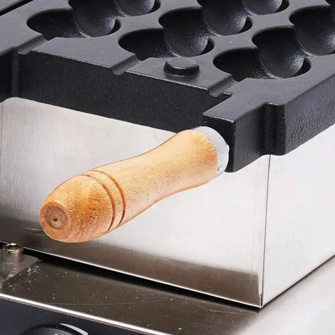 Detailed view of wooden handle on the dual heating plates of the Commercial 1800W Bubble Skewer Waffle Ball Machine.