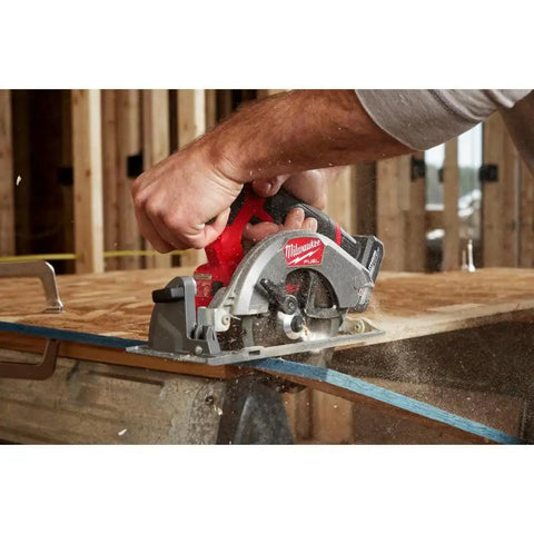 M12 Fuel 5-3/8 Inch Circular Saw Cordless With Brushless Powerstate Motor cutting wood on job site
