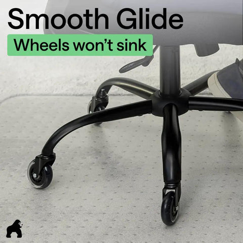 Slip Resistant Clear Office Chair Mat For Carpet Floors With Smooth Rolling Glide Under Desk Heavy Duty Plastic Computer Mat And Carpeted Floor Protector For Work And Gaming Chairs 29x47 shown with chair wheels.