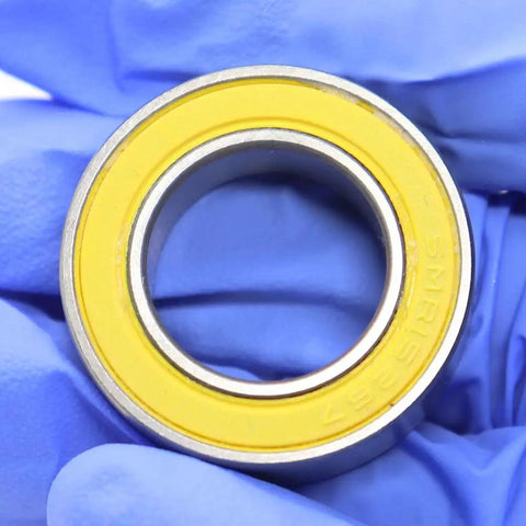 Ceramic Hybrid Radial Bearing 15X26X7Mm 152672RS Stainless Steel for Bicycle Hub in close-up view with yellow seal.