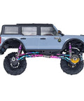 Side view of RC Crawler with 4 Pack Aluminum 24.5mm Beefed Up Shock Absorber Damper Set For Axial SCX30 1 By 30 RC Crawler Upgrades