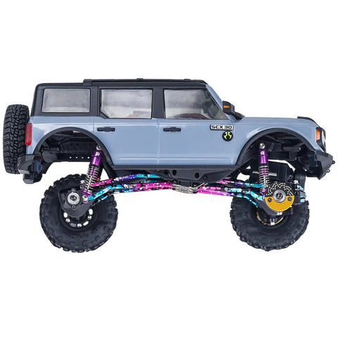 Side view of RC Crawler with 4 Pack Aluminum 24.5mm Beefed Up Shock Absorber Damper Set For Axial SCX30 1 By 30 RC Crawler Upgrades