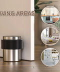Heavy Duty Stainless Steel 304 Floor Door Stops Featuring Satin Nickel Cylindrical Body With Thick Black Rubber Bumper To Shield Walls And Keep Doors Smooth Heavy Spring Loaded Stoppers No Fuss Setup Two Pack near a wall in a living area.