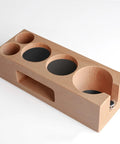 Top Shelf Wood Espresso Tamper Stand Fits 51Mm And 54Mm Tamps with sturdy natural wood base and four compartments.