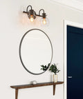 Black 2-Light Vanity Light Fixture With Clear Glass Shades, Dope Modern Farmhouse Bath Lighting, Matte Black Finish in bathroom setting