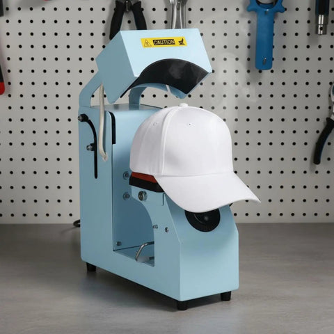 MVQJSUCI 2 In 1 Cap Hat Press Machine With Electric Automation Two Platen Choices shown with a white cap in operation.