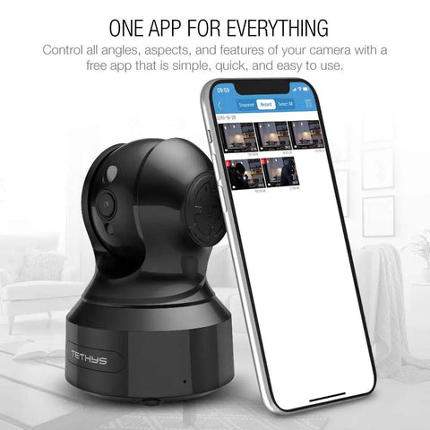 Indoor Wireless Security Camera 1080P With Alexa beside smartphone displaying app interface for camera control