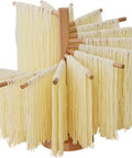 Foldable Wooden Pasta Drying Rack For Fresh Homemade Noodles, 12x12x33 cm, displaying fresh noodles on solid timber rods.