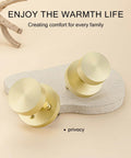 Brushed Gold Privacy Door Knobs Set, heavy-duty zinc alloy, round ball design on textured background, ideal for bedroom and bathroom.