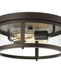 Two Light Outdoor Flush Mount Light In Antique Bronze With Clear Glass Diffuser, Farmhouse Vibe, close-up