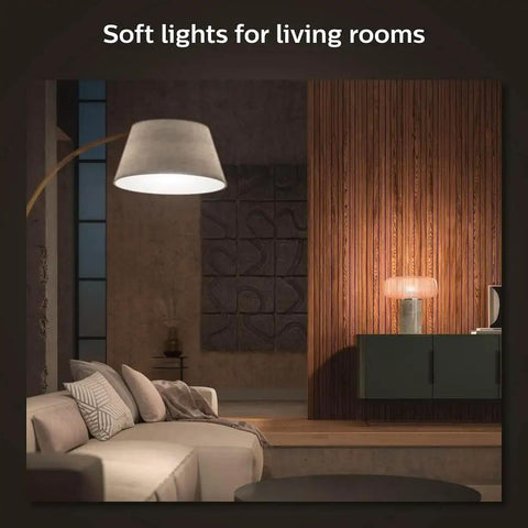 Smart A19 LED Bulb 75W Equivalent illuminating cozy living room with soft warm white light, showing indoor use in lamp fixture.