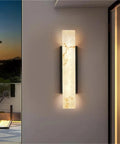 Modern Linear Wall Sconce Imitated Marble LED Wall Light,Warmth, sleek vertical design, premium marble texture, warm lighting.