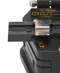 High Precision Fiber Cleaver With Tungsten Steel Vane For Accurate Cold Splicing On Fiber Optic Cables with visible blade and clamp.