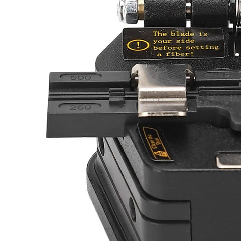 High Precision Fiber Cleaver With Tungsten Steel Vane For Accurate Cold Splicing On Fiber Optic Cables with visible blade and clamp.