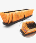 Heavy Duty 18 Inch Push Broom Long Handle Dual Bristle Gear For Concrete Garage Warehouse And Driveway Cleanup brush with orange bristles.