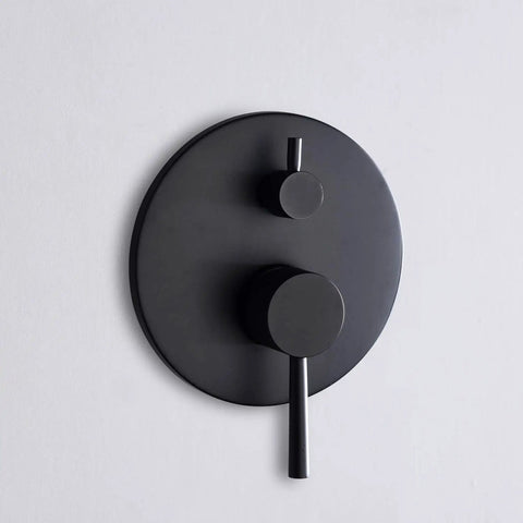 Close-up of Matte Black Wall Mount Bathtub Faucet knob, part of Matte Black Wall Mount Bathtub Faucet With Hand Shower, High Flow Waterfall Spout, Solid Brass Construction, 1/2 Inch NPT Standard Plumbing, Quick Bath Fill For Your Go-To Modern Spa Upgrade