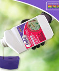 Eight Insect Control For Vegetables Fruits And Flowers 32 Oz Concentrate bottle pouring into garden sprayer