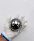 Heavy Duty 3 Inch Chrome Steel Bearing Ball, Solid Hardened Chrome 52100, Precision Ground With Mirror Finish, High Hardness And Load Capacity For Machinery, DIY Projects And Industrial Applications held in gloved hand