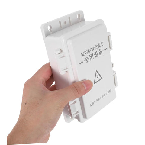 Hand holding Top Tier Phenofice White Plastic Electrical Junction Box Waterproof Case for outdoor electric installation.
