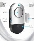 Diagram of Ultra Loud No Brainer 120dB Window And Door Alarm showing parts labeled with chime, switch, magnet, battery compartment.