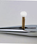 Close-up of white plastic screw cover cap with metal screw for furniture, part of the Plastic Screw Cover Caps Set 400 Pieces Hinged Design