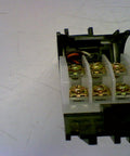 Internal view of a two-port pneumatic manifold, showing attached parts with quarter-inch fittings, used like new, durable shop ready.