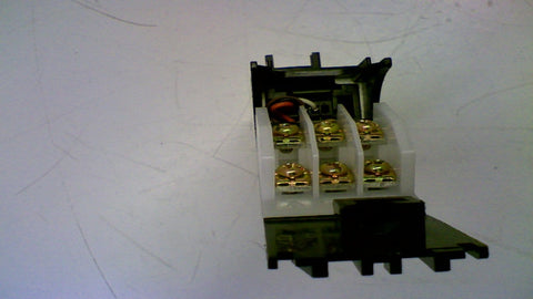 Internal view of a two-port pneumatic manifold, showing attached parts with quarter-inch fittings, used like new, durable shop ready.