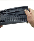Person holding an insert tray for 36 Piece Socket Set With Quarter Inch Square Drive Includes 13mm Sockets, Slotted, Phillips, Torx, Allen.