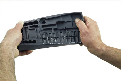 Person holding an insert tray for 36 Piece Socket Set With Quarter Inch Square Drive Includes 13mm Sockets, Slotted, Phillips, Torx, Allen.