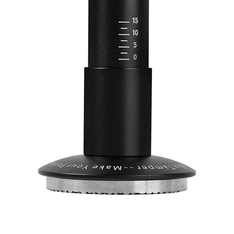 Heavy Hitter Spring Loaded Coffee Tamper With Precision Distribution Leveler And Clear Pressure Scale For Flawless Espresso Pucks, close-up view showing scale and base.
