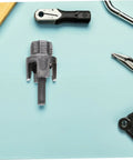 Awesome Electric Pipe Thread Cutter Kit For PvC & Metal with cutting edge for 1/2 inch pipes on a workbench.
