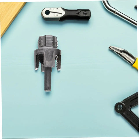 Awesome Electric Pipe Thread Cutter Kit For PvC & Metal with cutting edge for 1/2 inch pipes on a workbench.