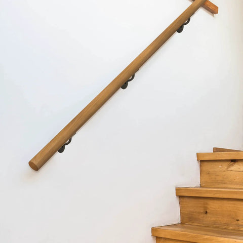 Wooden staircase with 5 Pack Jumbo Handrail Brackets for Stairways and Hallways in Oil Rubbed Bronze, mounting hardware included