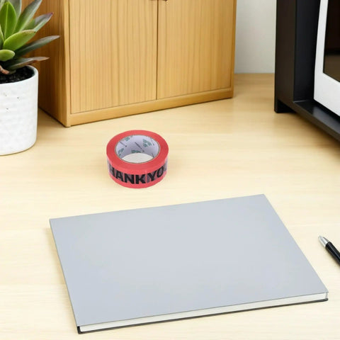 Heavy Duty Packing Tape 7 Roll Pack 100 Foot Each Sticks Like Crazy Strong Adhesion Carton Sealing Tape For Moving And Shipping Durable Plastic Material Ideal For Boxes And Shipping Supplies, pink roll on desk