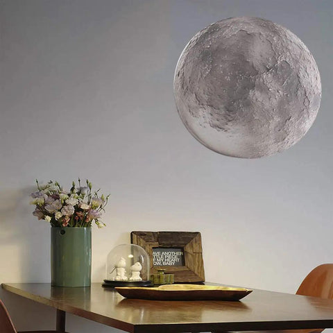 3D Moon Lamp LED Moon Light With Remote Control 12 Moon Phases 10 Inch Night Light on wall above wooden table and decor