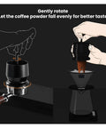 User gently rotates Three Piece Sleek Espresso Powder Receiver Cup And Dosing Funnel Fits 51 54 58Mm Portafilters for even coffee distribution.