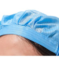 No Sweat Antistatic Work Caps Featuring Ventilated Mesh Window durable blue cap close-up on head for food processing and cleanroom use.