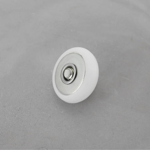 Close-up of a single 8 Piece Oval Edge Shower Door Roller with 19mm diameter and 6mm thickness for glass shower doors.