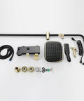 Heavy Duty Wall Mount Shower System With Slick Black Finish Adjustable Rain Head Four Way Mixer Valve Easy Grip Handheld Sprayer And Top Shelf Stainless Steel Bathroom Combo Kit components arranged for installation.