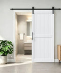 White Interior Sliding Barn Door 38 By 84 Inches With Heavy Duty Track Smooth Glide Rollers For Closet Bedroom Bathroom No Sweat Setup Moisture Shield Finish Clean Look Room Refresh in a bathroom setting with modern decor.