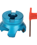 Blue aluminum CNC face mill head with central bore and four slots; comes with orange hex-key (2-piece set).