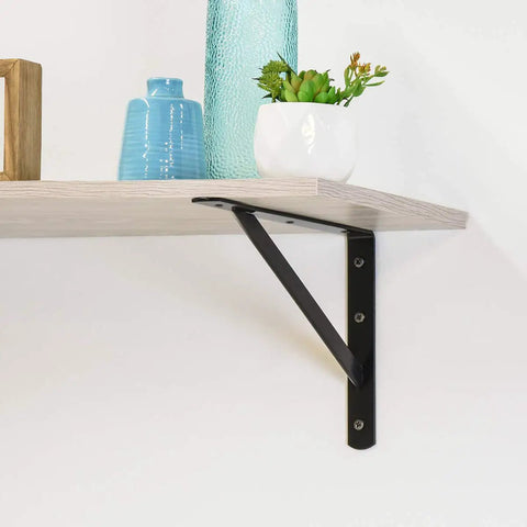 Beefy Heavy Duty Shelf Brackets Set 10 Pack Black Powder Coat Steel 10 By 16 Inches supporting a wooden shelf in garage or workshop
