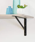 Beefy Heavy Duty Metal Shelf Brackets Set For 20 Inch By 13 Inch Black Powder Coated Steel 1000 Lbs Per Pair Three Pre Drilled Quarter Inch Holes On Each Side Mounting Hardware Not Included supporting a shelf
